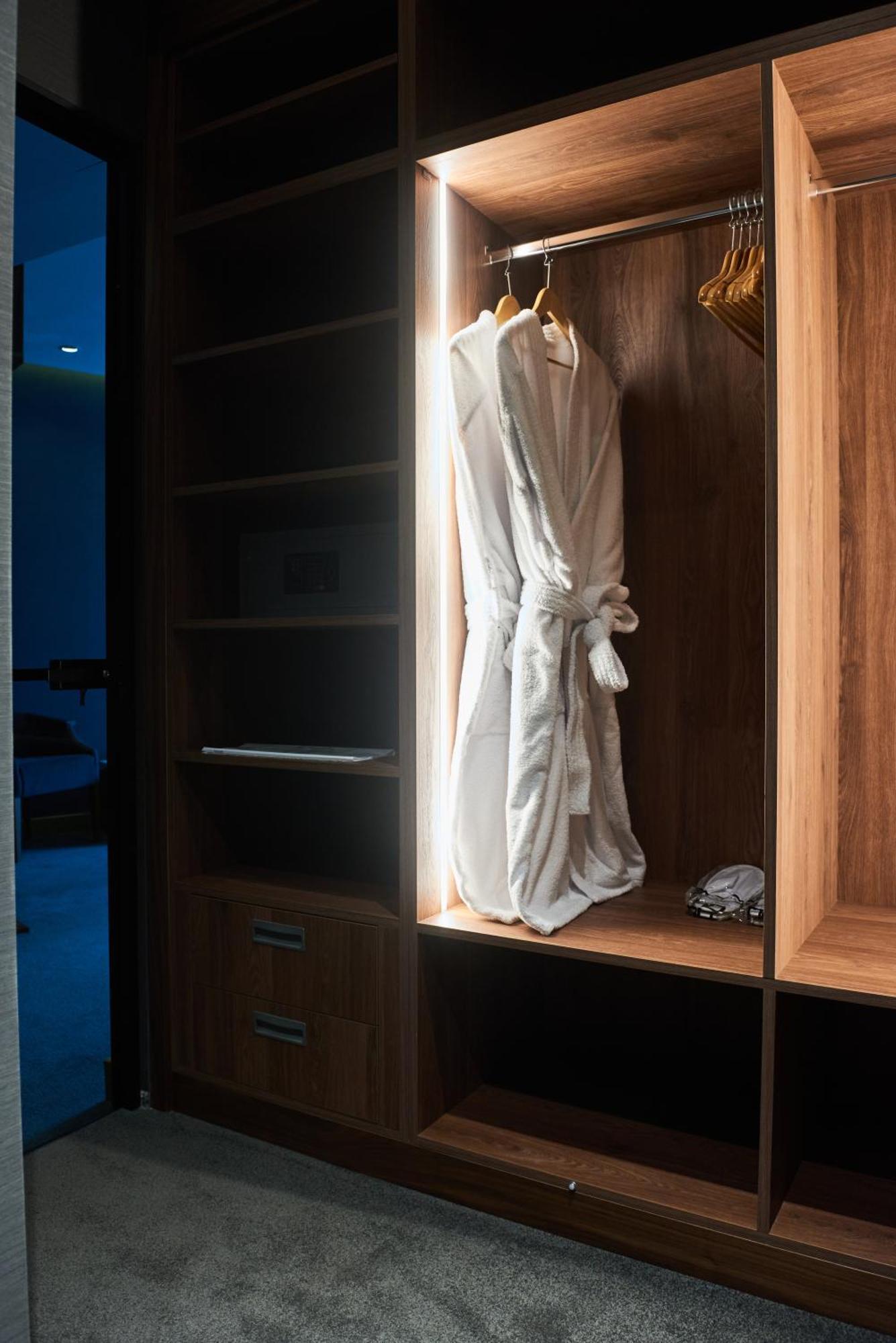 Hotel Pupin Novi Sad Exterior photo A bathrobe hanging in a closet
